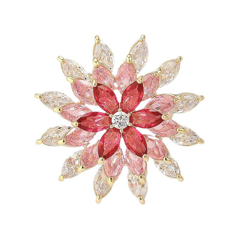 Sparkling rotating sunflower brooch featuring pink gradient marquise cubic zirconia stones in 18K gold plating