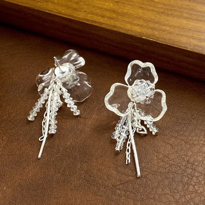 Silver S925 floral drop earrings featuring crystal-encrusted flower studs and elegant dangling tassel chains