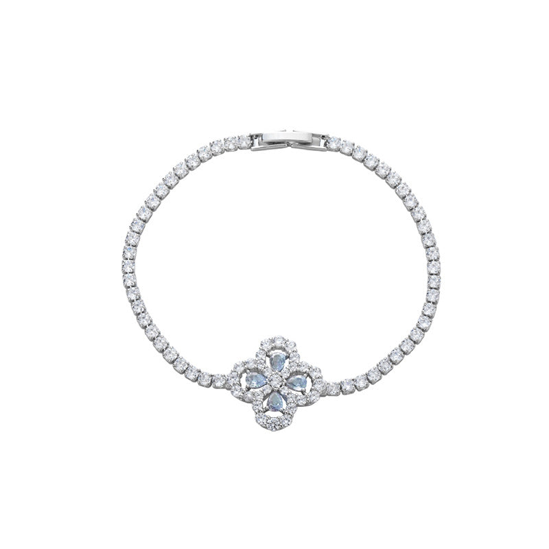 S925 sterling silver tennis bracelet with a four-leaf clover halo charm featuring sparkling cubic zirconia