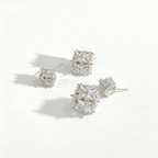 Minimalist S925 silver cube stud earrings featuring a sparkling central zirconia, available in gold and silver