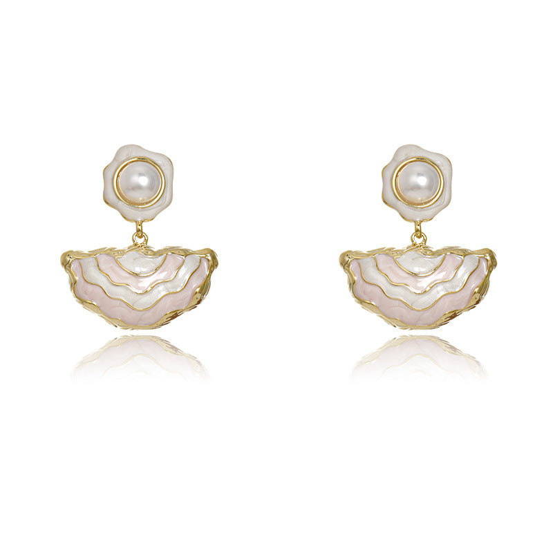 Gold S925 silver drop earrings featuring pink enamel studs and elegant dangling white pearls with a handmade finish