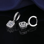 S925 sterling silver stud earrings featuring a brilliant round zirconia center with a sparkling halo pave border