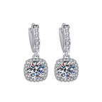 S925 sterling silver stud earrings featuring a brilliant round zirconia center with a sparkling halo pave border