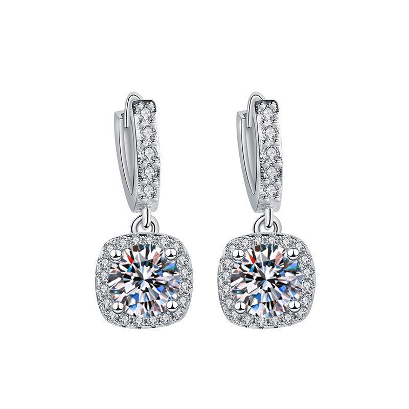 S925 sterling silver stud earrings featuring a brilliant round zirconia center with a sparkling halo pave border