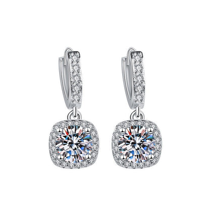 S925 sterling silver stud earrings featuring a brilliant round zirconia center with a sparkling halo pave border
