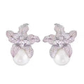 Elegant S925 sterling silver lily flower stud earrings featuring a lustrous white pearl center in a silver tone