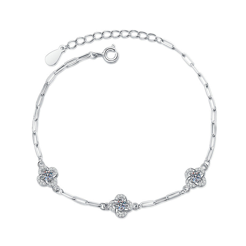 Elegant S925 sterling silver bracelet featuring a blooming flower charm set with a brilliant moissanite stone