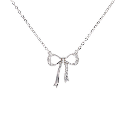 Minimalist S925 sterling silver bowknot pendant necklace featuring a delicate ribbon design for a romantic look