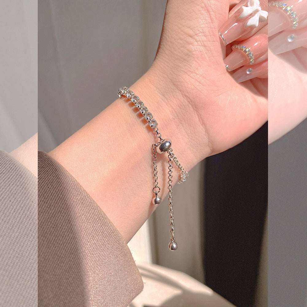 Elegant S925 sterling silver bracelet featuring a round halo design with sparkling white cubic zirconia