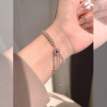Elegant S925 sterling silver bracelet featuring a round halo design with sparkling white cubic zirconia