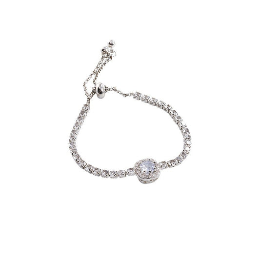 Elegant S925 sterling silver bracelet featuring a round halo design with sparkling white cubic zirconia