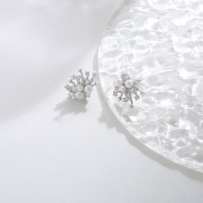 S925 sterling silver drop earrings featuring a sparkling round zirconia stud and a dangling lustrous white pearl