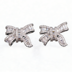 Silver bowknot stud earrings featuring a delicate ribbon design fully set with sparkling clear zirconia stones