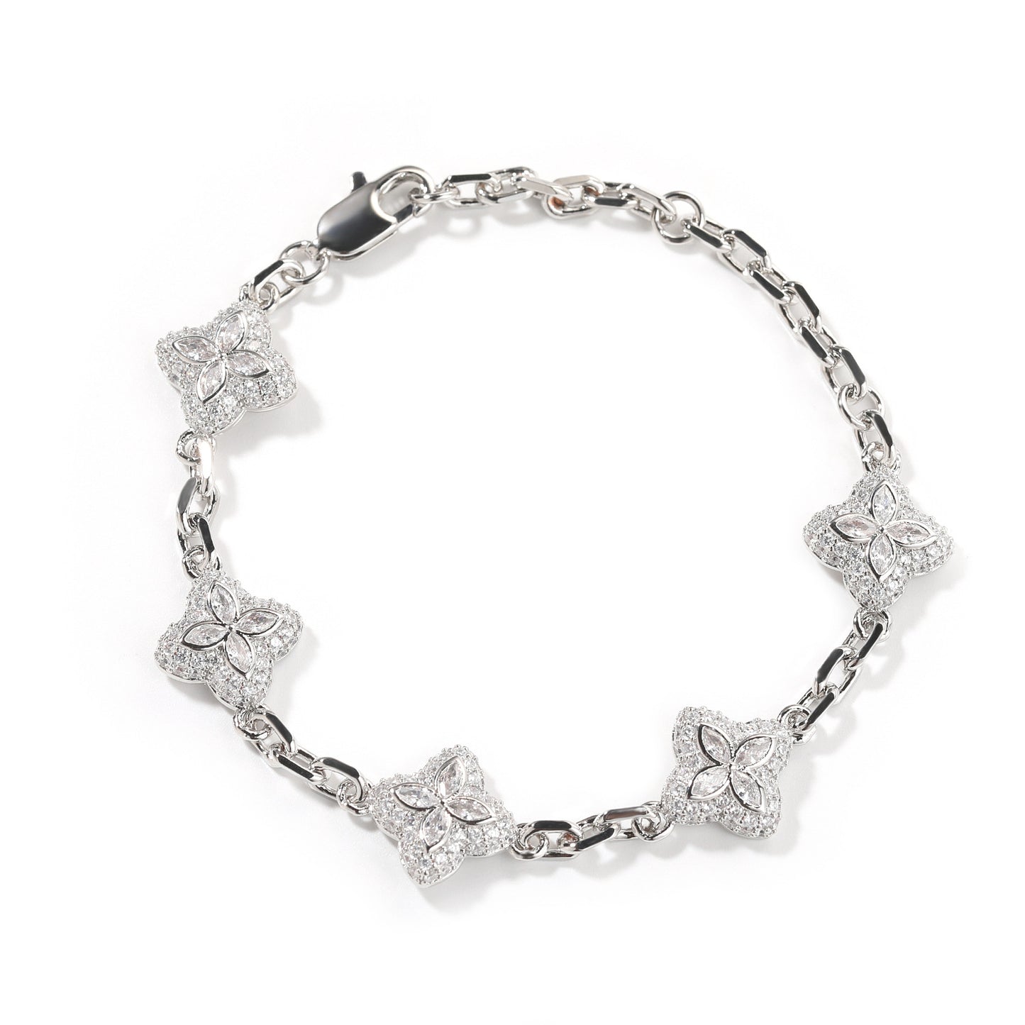 Elegant silver four-leaf clover bangle with pink and green gemstone centers surrounded by a sparkling zirconia halo