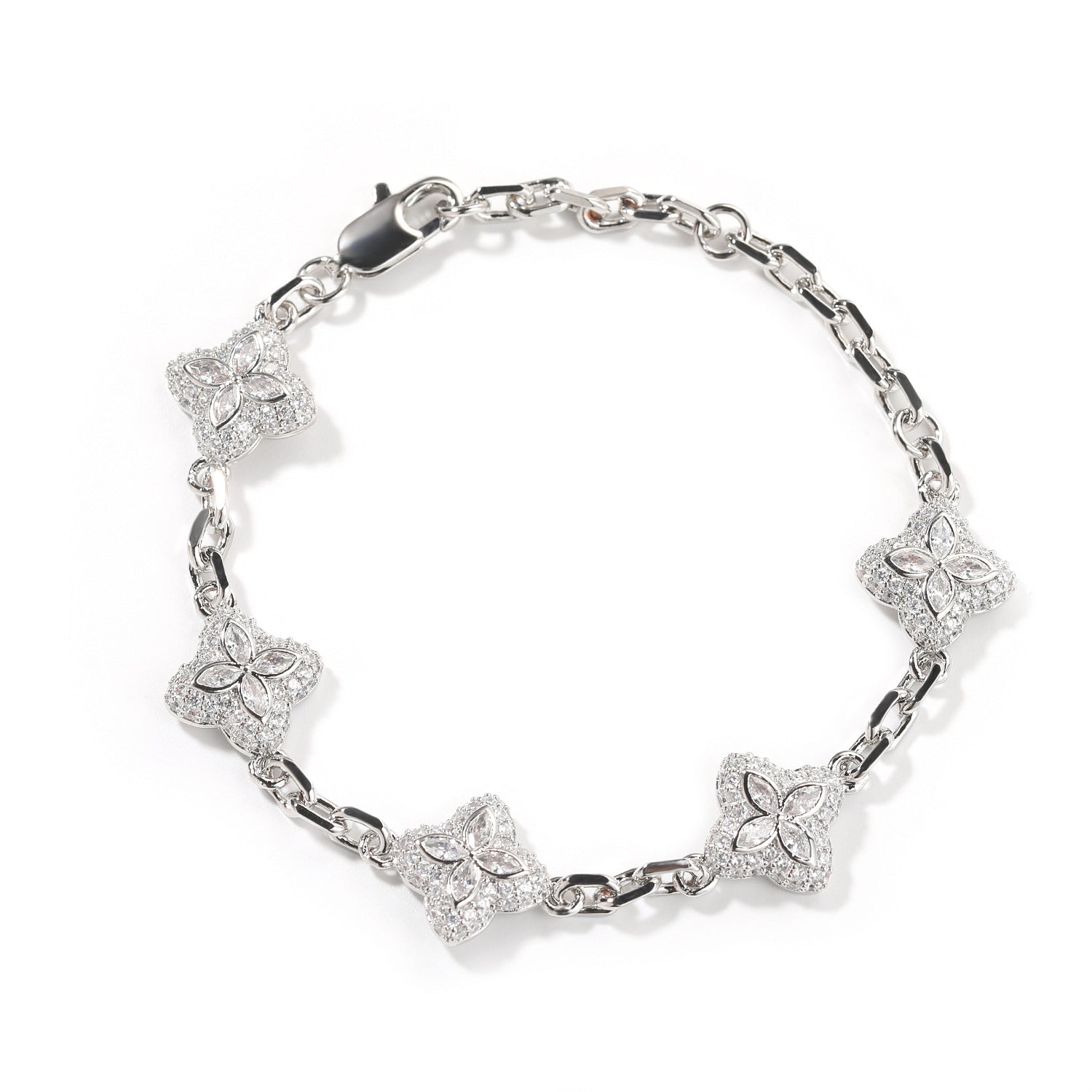 Elegant silver four-leaf clover bangle with pink and green gemstone centers surrounded by a sparkling zirconia halo