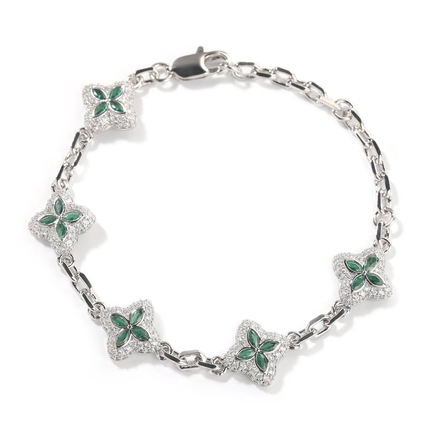 Elegant silver four-leaf clover bangle with pink and green gemstone centers surrounded by a sparkling zirconia halo