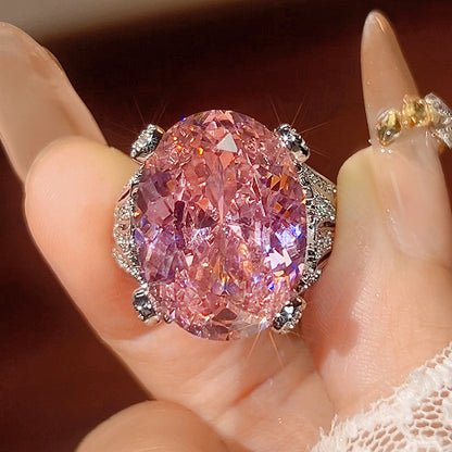 Romantic silver Open Ring featuring a Vibrant Pink Cubic Zirconia Stone and Sparkling Twisted Rope Band Design
