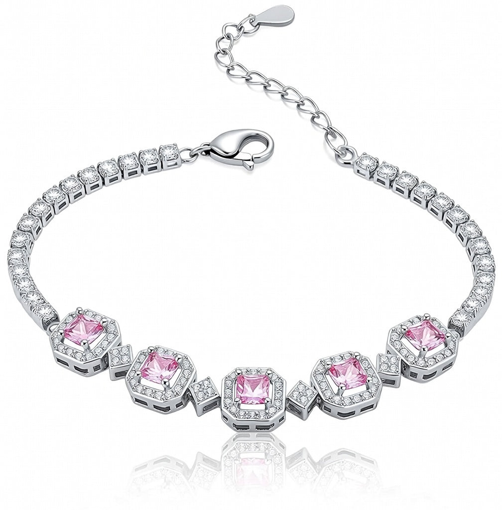 Elegant silver tennis bracelet with a pink round halo center stone and sparkling white cubic zirconia