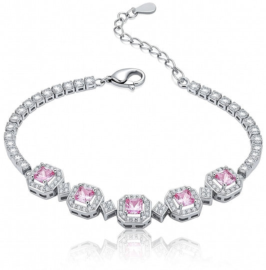 Elegant silver tennis bracelet with a pink round halo center stone and sparkling white cubic zirconia