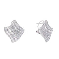 Silver huggie hoop earrings with a continuous row of sparkling clear zirconia stones in a pave setting
