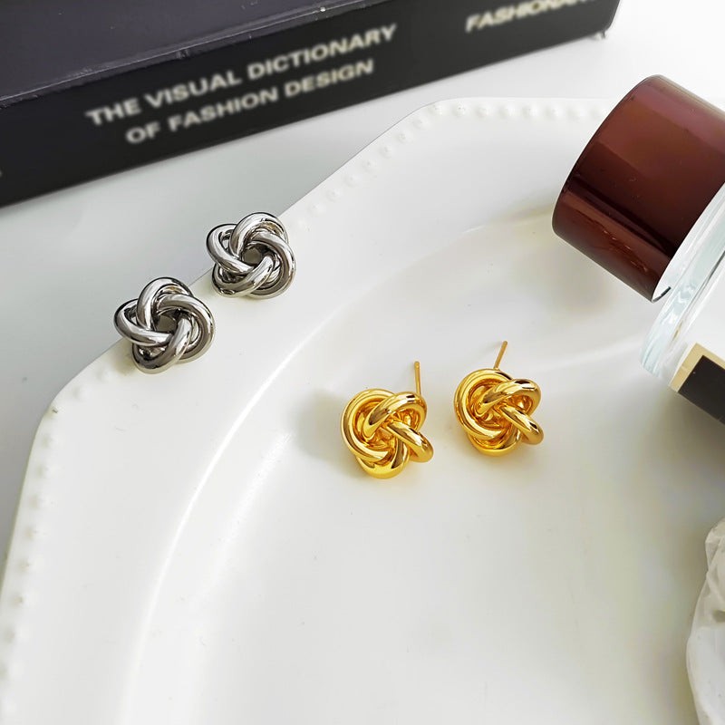 Bold gold  Stainless steel jewelry multi-strand interwoven love knot stud earrings with hollow woven texture.