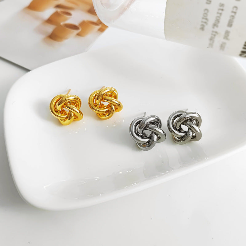 Bold gold  Stainless steel jewelry multi-strand interwoven love knot stud earrings with hollow woven texture.