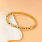 Vintage roman numeral engrave bangle with crystal accents in 18k gold plated titanium steel jewelry.