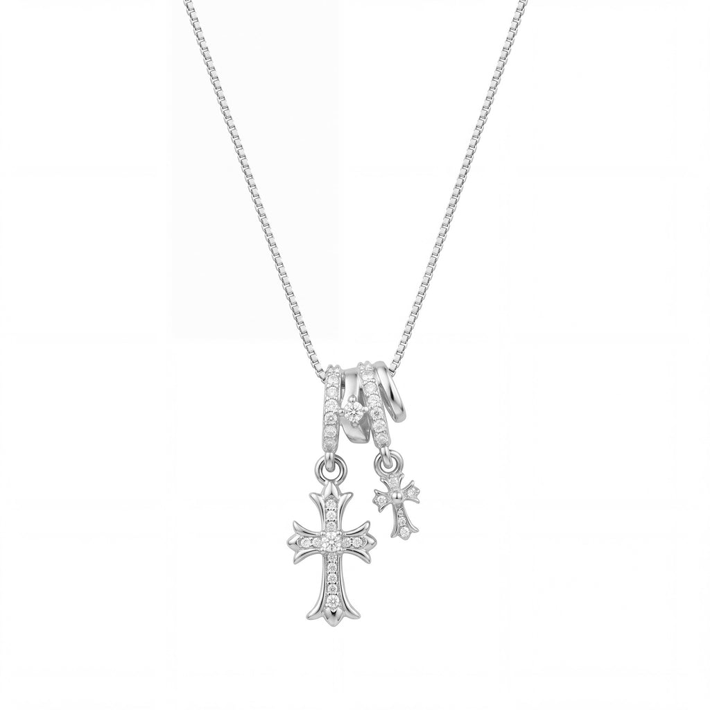 Waterproof stainless steel jewelry collection featuring champagne gold hypoallergenic gold plated double cross CZ pave pendant necklace.