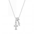 Waterproof stainless steel jewelry collection featuring champagne gold hypoallergenic gold plated double cross CZ pave pendant necklace.