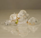 Waterproof stainless steel jewelry collection featuring hypoallergenic gold plated olive green glass teardrop pendant snake chain necklace.