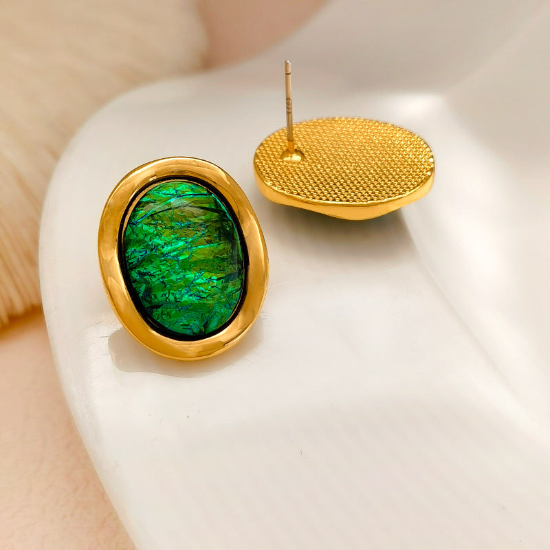 Waterproof stainless steel jewelry collection featuring hypoallergenic gold plated vintage oval emerald green resin stone stud earrings.