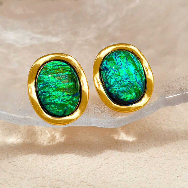 Waterproof stainless steel jewelry collection featuring hypoallergenic gold plated vintage oval emerald green resin stone stud earrings.