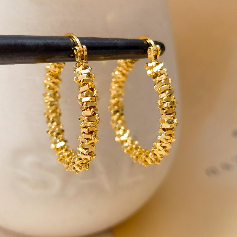 Waterproof stainless steel jewelry collection featuring hypoallergenic gold plated and silver glitter textured hoop earrings