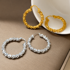 Waterproof stainless steel jewelry collection featuring hypoallergenic gold plated and silver glitter textured hoop earrings