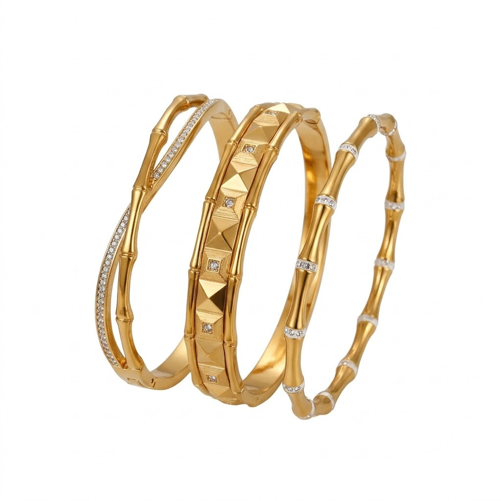 Wholesale stainless steel jewelry low MOQ 304 stainless steel 18k gold plated bamboo joint cz bangle bracelets in geometric pyramid and paved styles.