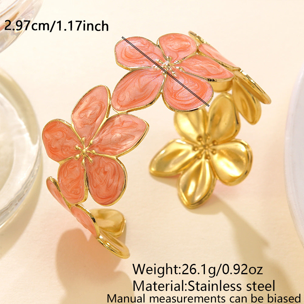 Wholesale stainless steel jewelry low MOQ 304 stainless steel gold open cuff bangle bracelet with colorful enamel flower motifs.