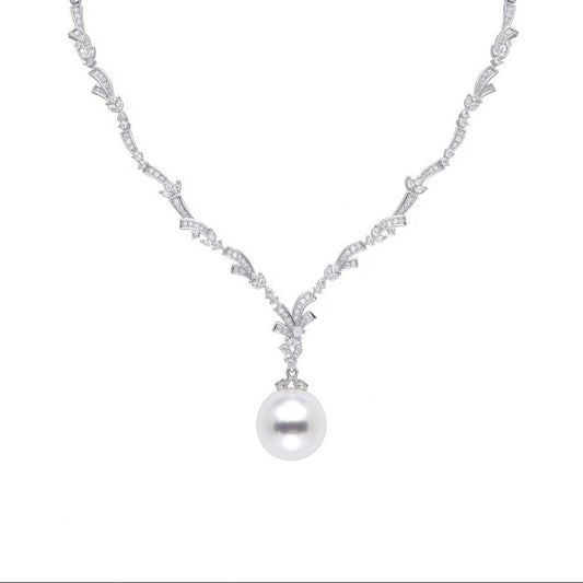 Elegant Y-shaped lariat necklace featuring a delicate pearl and sparkling cubic zirconia pendant